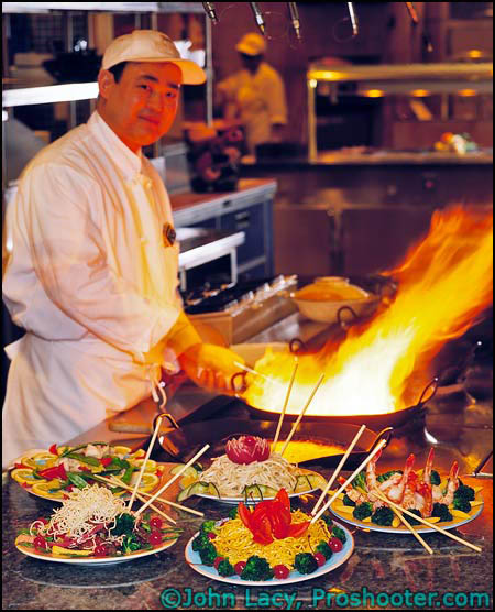 Chef at Wok Station of Casino Buffet by Proshooter